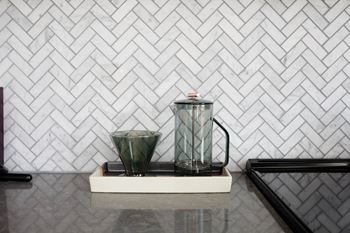 Herringbone tile backsplashes